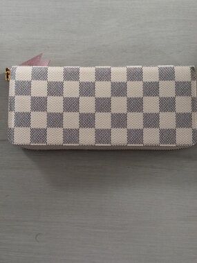 The Louis Vuitton Zippy Wallet Clemence Damier Azur